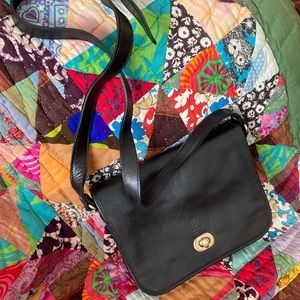 Italian leather cross-body bag.